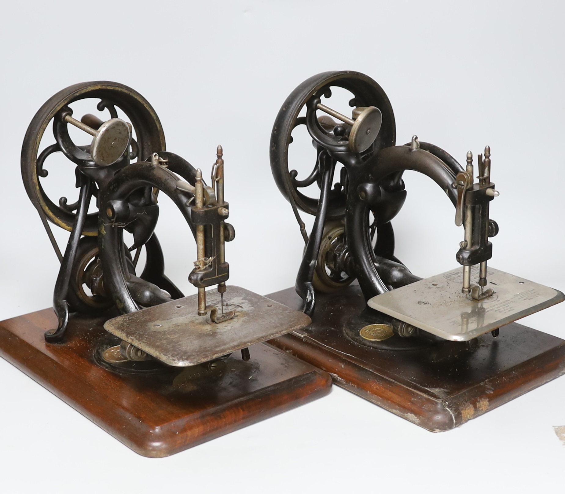 Two Willcox and Gibbs patent sewing machines, each 34cm wide